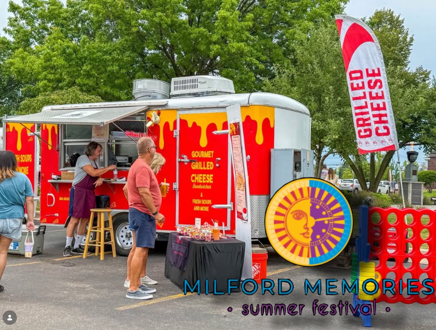 Guests ordering grilled cheese from our trailer at Milford Memories Summer Festival